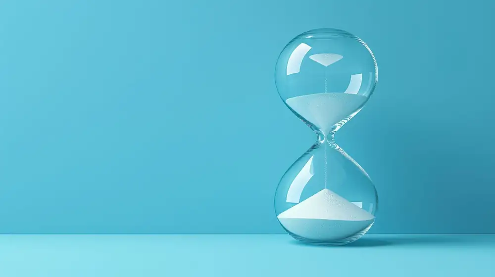 An hourglass with sand running through it